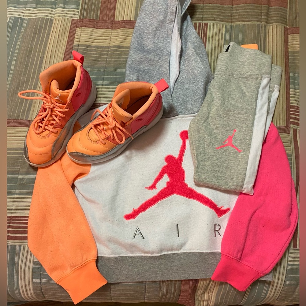 Girls Jordan sweatshirt, leggings and sneakers.